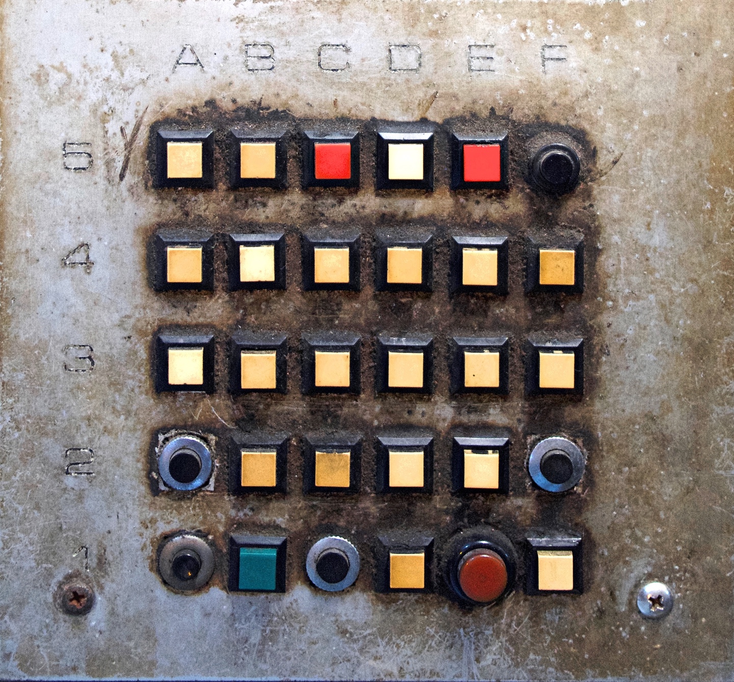 A building call system, with buttons mixed of different colours and shapes